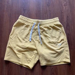 yellow gymshark athleisure fleece shorts